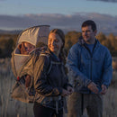 Osprey Poco LT Child Carrier worn outdoors, lifestyle shot