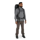 Osprey Rook 50 Backpack worn, full length side profile, Dark Charcoal/Silver