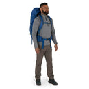 Osprey Rook 50 Backpack worn, full length side profile, Astology Blue