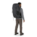 Osprey Rook 50 Backpack worn, full length side profile, Dark Charcoal/Silver