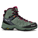 A mid-cut outdoor hiking boot by Salewa, featuring an olive green suede and synthetic upper with black overlays, dark green Vibram sole, and magenta laces and lining.