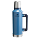 A blue Stanley vacuum-insulated water bottle with a stainless steel lid and base, featuring a dark blue carrying handle on a white background.