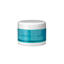 A white jar labeled with turquoise accents and multilingual text displays the words “MOUNTAIN CLIMBING APPROACH TRAIL RUNNING” along the bottom. The label describes Scarpa’s HS12 Footwear Cream as a silicone-based cream formulated to waterproof leather, including full-grain leather products.