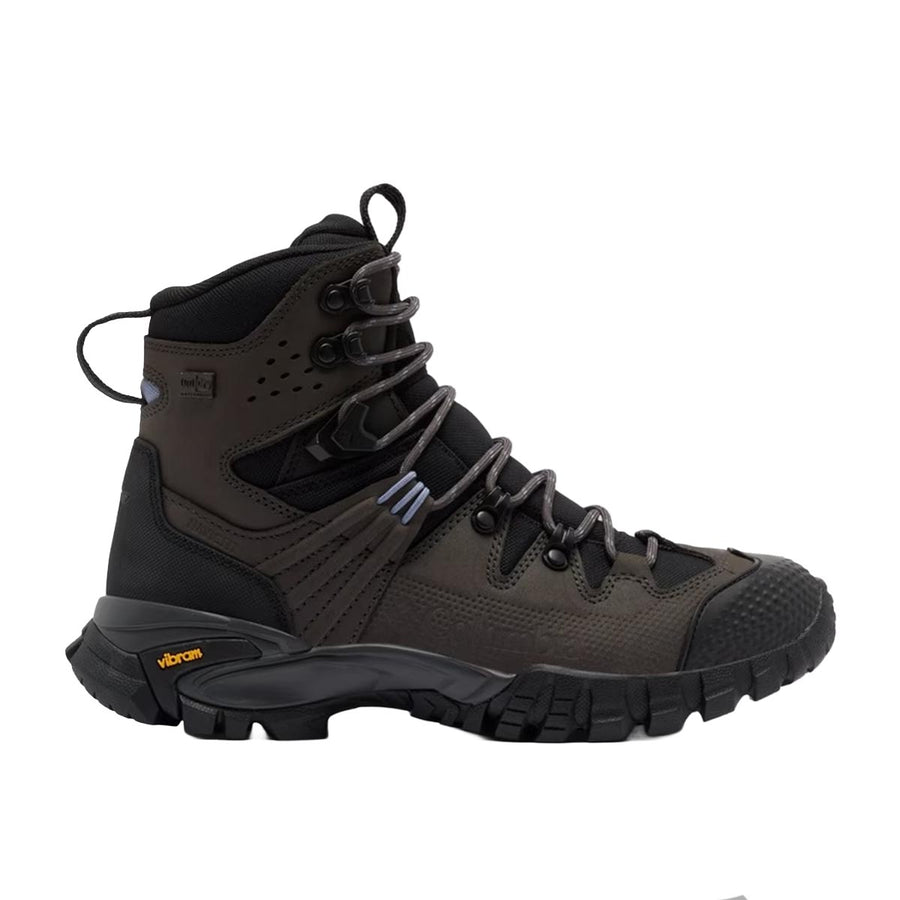 The Columbia Womens GeoTerra OutDry Leather Hiking Boot features high ankle support, a rugged Vibram sole, and gray laces. Shown in side profile on a white background.