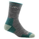 The Darn Tough Womens Hiker Micro Crew Midweight Hiking Sock features a gray and teal design, ribbed texture, reinforced heel, toe, and cuff, plus a small mountain detail for lasting comfort and blister-free hikes.