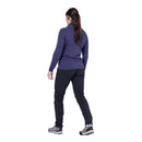 Model wearing purple hooded jacket, back view
