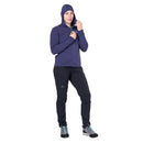 Model wearing purple hooded jacket, casual standing pose