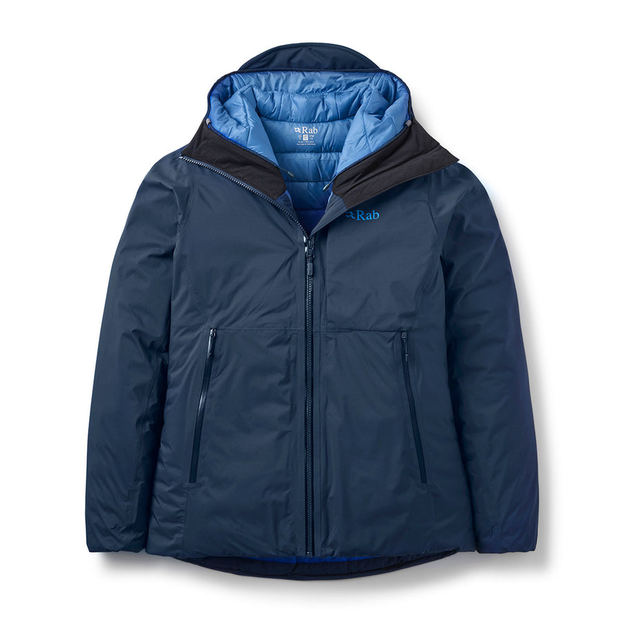 The Womens Microlight Shield Waterproof Down Jacket by Rab is a blue insulated winter jacket with a hood, front zipper, two zippered pockets, and a lighter blue inner lining. Featuring the Rab logo on the chest, this jacket is crafted with Pertex Shield fabric for enhanced waterproof protection against the elements.