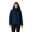 A woman with long curly hair is standing and smiling against a white background, wearing the Rab Womens Microlight Shield Waterproof Down Jacket in dark blue—crafted with innovative Pertex Shield fabric—and black pants.