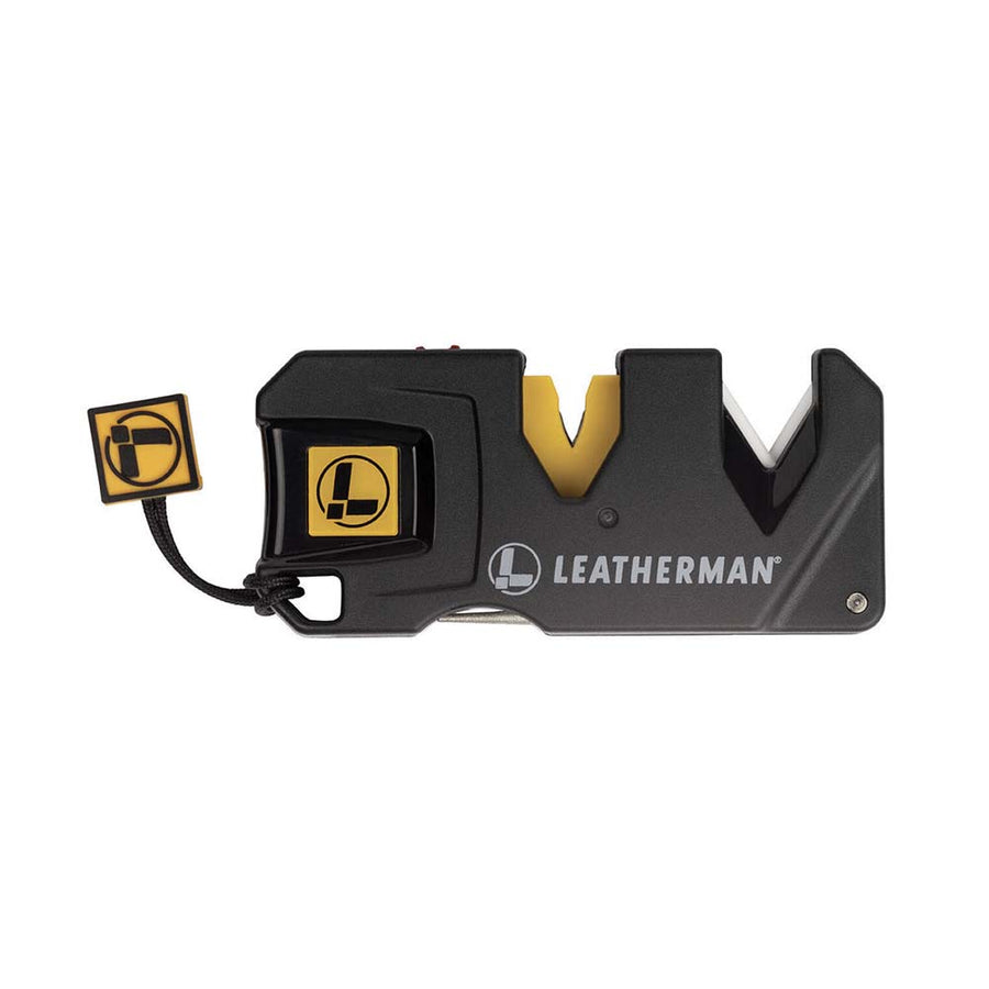 The Leatherman® Blade Sharpener is a portable black tool by Leatherman, featuring a yellow sharpening slot and logo on both the device and lanyard, designed specifically for sharpening blades.