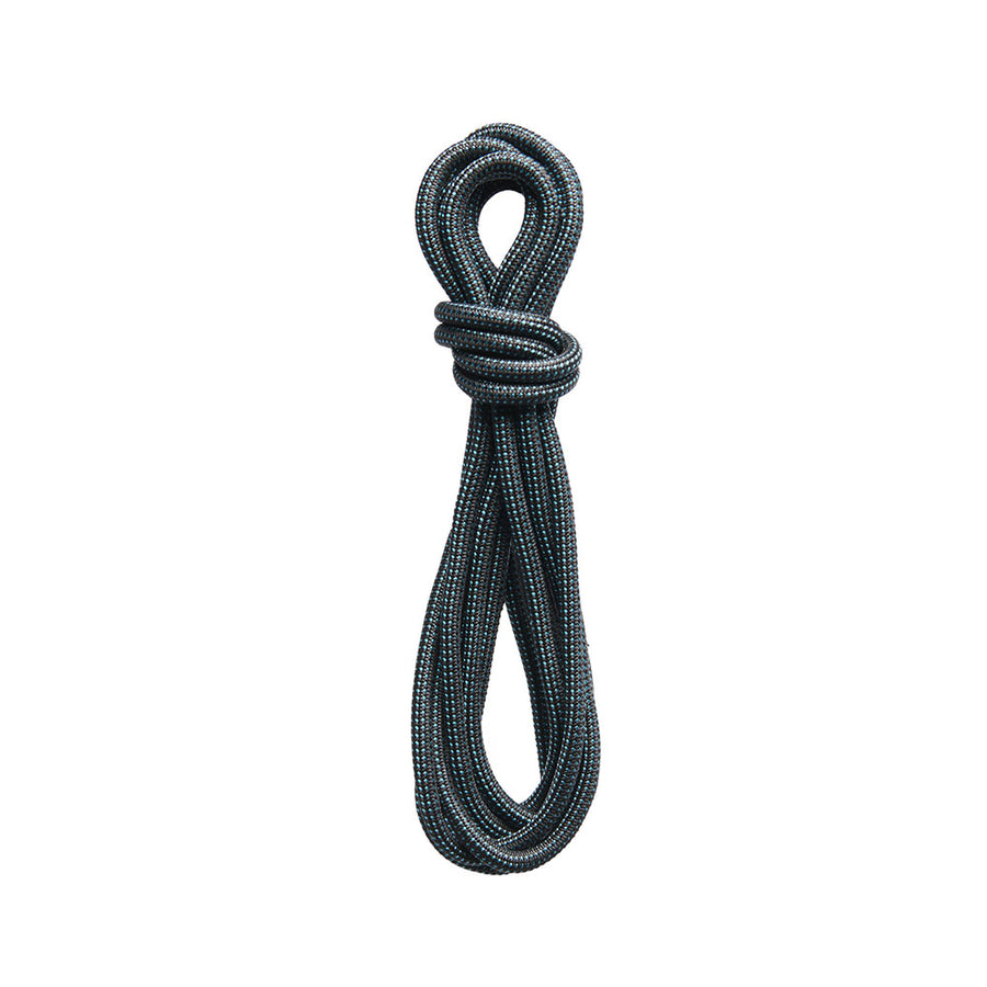 Coiled black rope on a white background