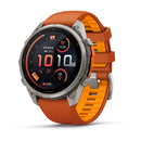 A Garmin fēnix 9 Pro inReach multisport GPS smartwatch with a silver bezel and orange-yellow silicone strap, featuring a round digital display showing time, steps, heart rate, and other fitness stats. With advanced satellite connectivity, the fēnix 9 Pro inReach is the perfect companion for tracking all your outdoor adventures.