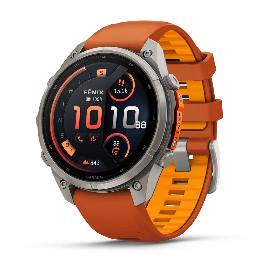 A Garmin fēnix 9 Pro inReach multisport GPS smartwatch with a silver bezel and orange-yellow silicone strap, featuring a round digital display showing time, steps, heart rate, and other fitness stats. With advanced satellite connectivity, the fēnix 9 Pro inReach is the perfect companion for tracking all your outdoor adventures.