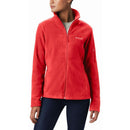 A woman models the Columbia Women’s Fast Trek™ II Fleece Jacket—featuring a high collar, long sleeves, and zippered pockets—in bright red with dark jeans against a plain white background.