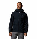 Man wearing a black Columbia jacket on a white background