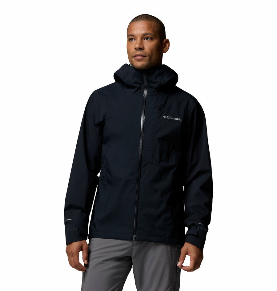 Man wearing a black Columbia jacket on a white background