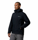 Man wearing a black Columbia jacket on a white background
