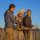 Osprey Poco LT Child Carrier worn outdoors, lifestyle shot
