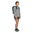 Osprey Fairview 70 Travel Pack worn, full length side profile, Cascade Blue/Teal Blue