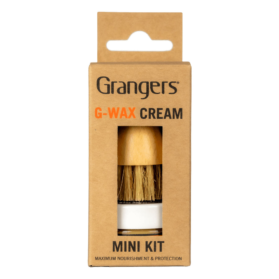 Grangers G-Wax Cream Mini Kit in its original kraft paper packaging, featuring a visible window showing the wooden-handled brush with natural bristles and white wax container.