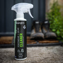 Grangers footwear cleaner spray bottle with boots in the background