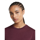 A person wearing an odor-resistant Icebreaker Women’s 150 Tech Lite T-Shirt with a crew neck.