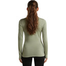 Back view of a person wearing a sage green Women’s Merino 260 Tech Long Sleeve Crew.