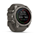 A Garmin fēnix 9 multisport GPS smartwatch in gray presents your weekly activity stats—tracking 7 days, 12 hours, 6 activities, covering a total distance of 93.39, and burning 7,853 active calories—displayed with colorful icons for running, biking, swimming, and walking on the vibrant AMOLED screen.