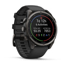 A black Garmin fēnix 9 multisport GPS smartwatch displays fitness statistics such as tracked time (7d 12h), number of activities (6), distance (93.39), and active calories (7853). Its vibrant AMOLED display showcases colored icons for activities and data.