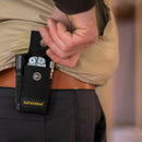 Black leatherman multitool sheath on a belt loop being opened