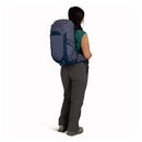 Osprey Tempest 26 Backpack worn, full length side profile, Anchor Blue/Atlas