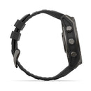 Side view of the Garmin fēnix 9, a black multisport GPS smartwatch featuring a textured band and three round buttons on the right side of the case.
