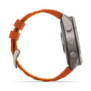 Side view of the rugged Garmin fēnix 9 Pro inReach multisport GPS smartwatch, featuring an orange strap and three buttons on the right side of a silver case, with satellite connectivity, displayed against a white background.
