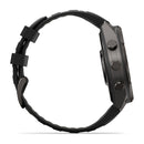 Side view of the Garmin fēnix 9 Pro inReach, a black multisport GPS smartwatch featuring two buttons on the right side, a textured strap, and a buckle clasp. The watch face is not visible from this angle. This design highlights the robust style and advanced satellite connectivity that define the fēnix 9 Pro inReach.