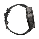 Side view of a black Garmin fēnix 9 Pro inReach multisport GPS smartwatch, featuring a textured strap and three round buttons on the case, displayed against a white background.