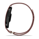 A side view of the Garmin CIRQA Smart Band, featuring a black case and a brown, looped perforated band, is displayed against a white background, emphasizing its 24/7 health monitoring capabilities.