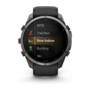 A Garmin fēnix 9 Pro inReach multisport GPS smartwatch displays a menu with fitness activity options: MTB, Trail Run, Row Indoor (highlighted), Rucking, and Ski. The watch features a black band, a round face with four side buttons, and advanced satellite connectivity for precise tracking during any workout.