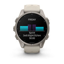 A Garmin fēnix 9 multisport GPS smartwatch in beige features a vibrant AMOLED display, showing a workout screen with Sprint intervals—3x8:00 at 4:55/km pace and a total time of 50:00—plus purple and blue bars above the text and “FRIDAY” displayed at the top.