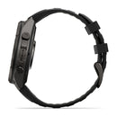 Side view of a black Garmin fēnix 9 Pro inReach multisport GPS smartwatch with a round case, two side buttons, and a textured wristband. The word “Fenix” is visible on the side of the watch casing, highlighting the advanced features and satellite connectivity of the Garmin fēnix 9 Pro inReach.
