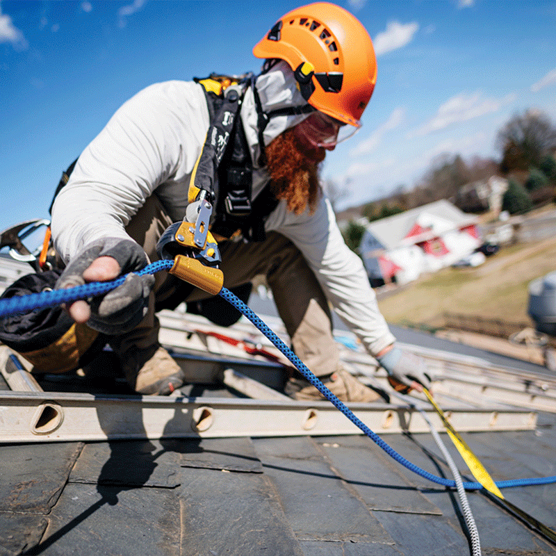 Petzl industrial worker on roof wearing ppe gear