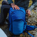 Osprey Talon 22 Backpack worn outdoors, lifestyle picture