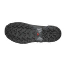 Black Salomon hiking shoe sole with tread pattern on a white background