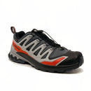 The Salomon Mens XA Pro 3D V9 GORE-TEX Trail Shoe in black, gray, and red is shown angled on a white background, featuring a rugged sole for technical terrain and a quick-lace system.