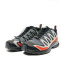 The Salomon Mens XA Pro 3D V9 GORE-TEX Trail Shoes feature black, gray, and orange waterproof uppers, thick rubber soles, and quick-lace fastening—designed for technical terrain and shown side by side on a white background.