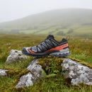 Gray and black Salomon XA PRO shoe with orange accents on a white background