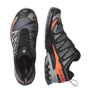 Black and orange hiking shoes with visible brand logo on a white background
