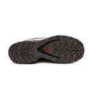 The image displays the treaded sole of the Salomon Womens XA Pro 3D V9 GORE-TEX Trail Shoe, featuring a rugged grip for technical trails and a small red triangle near the center, set against a plain white background.