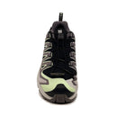 The Salomon Womens XA Pro 3D V9 GORE-TEX Trail Shoe features a black and grey design with light green accents, a white sole, GORE-TEX waterproofing, and a quick-lace system—ideal for technical terrain.