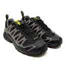The Salomon Mens XA Pro 3D V9 GORE-TEX Trail Shoe in black and gray with yellow accents features a rugged sole for technical terrain and a quick-lace system, shown from a front-right angle.