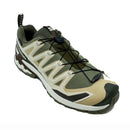 The Salomon Mens XA Pro 3D V9 GORE-TEX Trail Shoe, in green and beige with black laces and a rugged sole, is waterproof and designed for technical terrain. It’s shown against a white background.